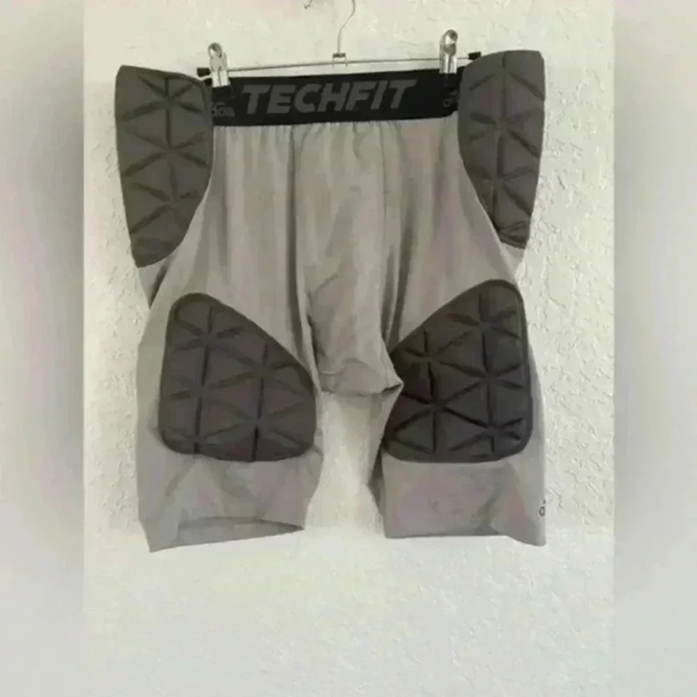 Adidas tech fit men’s XL padded compression football shorts